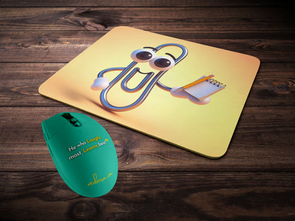 Paperclip with big, expressive eyes and a smiling face, holding a tiny notepad and pencilmousepad mockup style 2